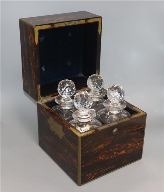 A Victorian coromandel four bottle decanter box